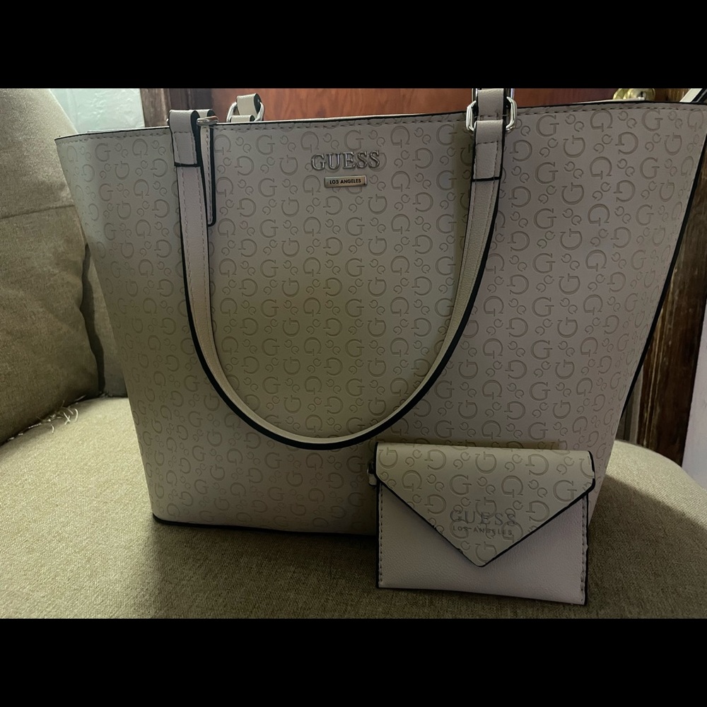 Guess purse with little bag.